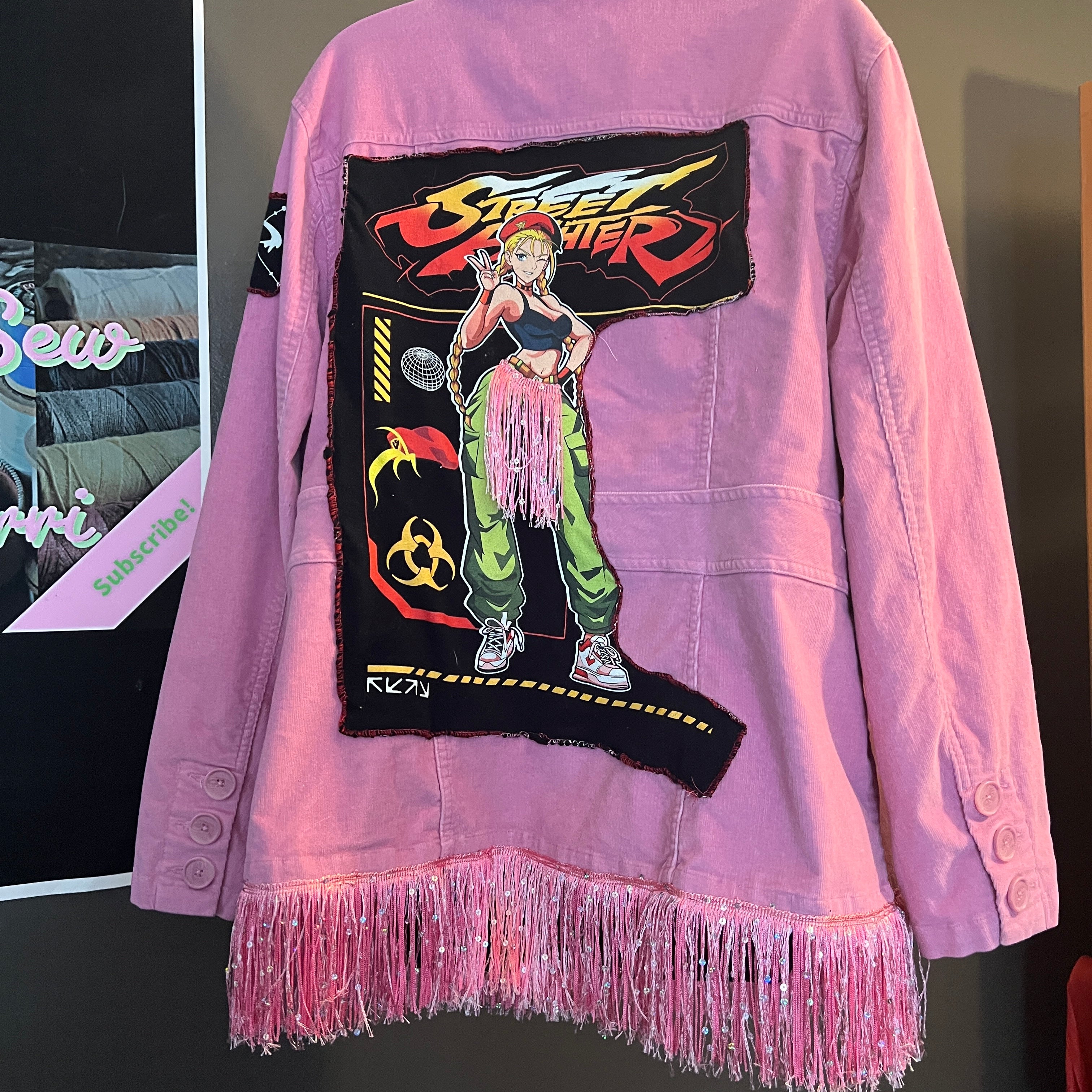 Street FighterCammy- if this one of a kind, streetfighter blazer and anticipation for the new movie coming out this fall 2026. This is one of a kind in the whole wide world don’t miss out. ￼